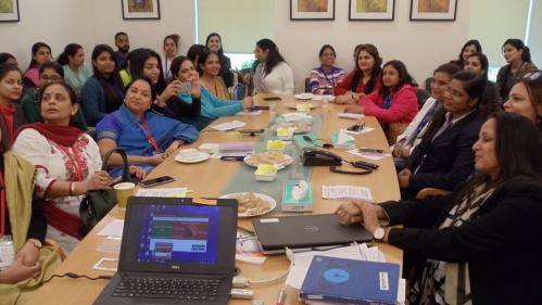 Participants posing for a photograph in between sessions 2