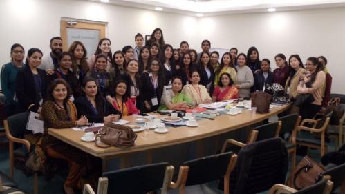 Participants posing for a photograph in between sessions 3